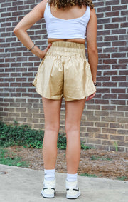 The Faux Leather Smocked Shorts (Gold)