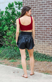 The Faux Leather Smocked Shorts (Black)