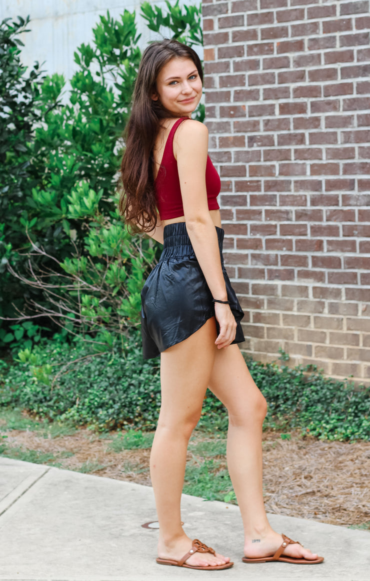 The Faux Leather Smocked Shorts (Black)
