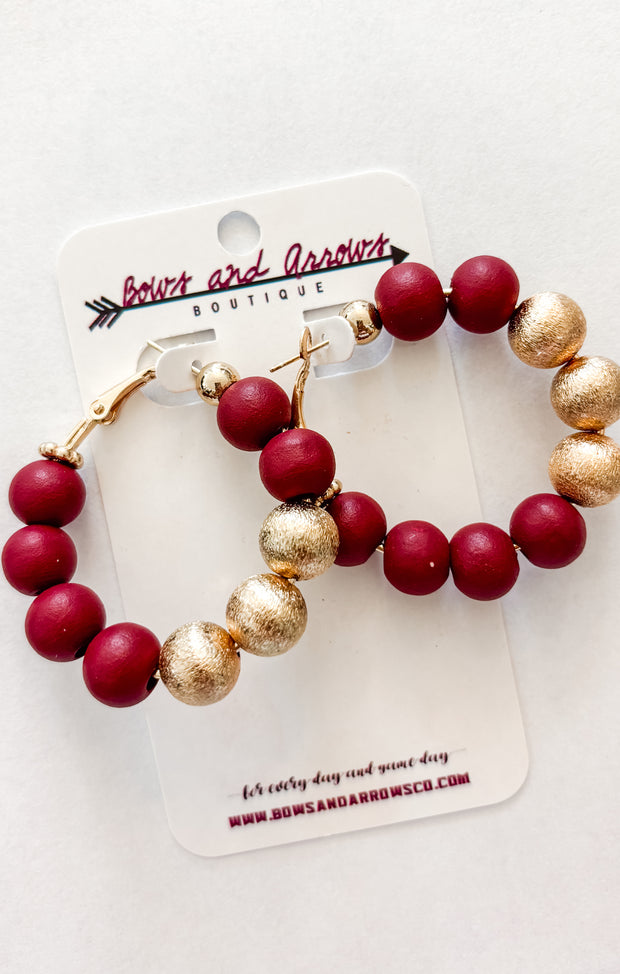The Garnet + Gold Ball Hoops